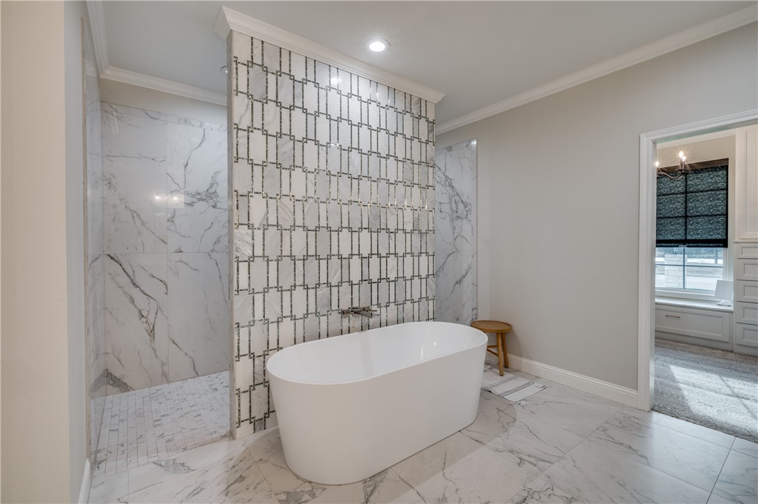 164 Water View Lane Robinson, TX 76706 - Photo 18 of 26 a bathroom with a bathtub and shower