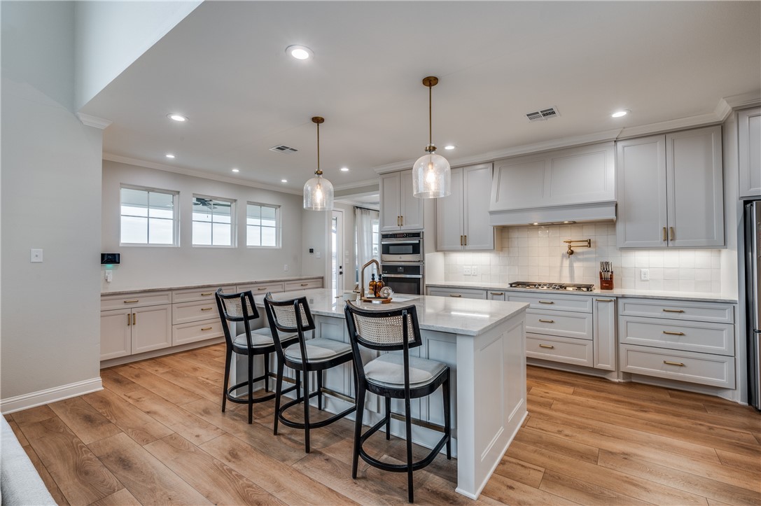 164 Water View Lane Robinson, TX 76706 - Photo 9 of 26 a large kitchen with a table and chairs