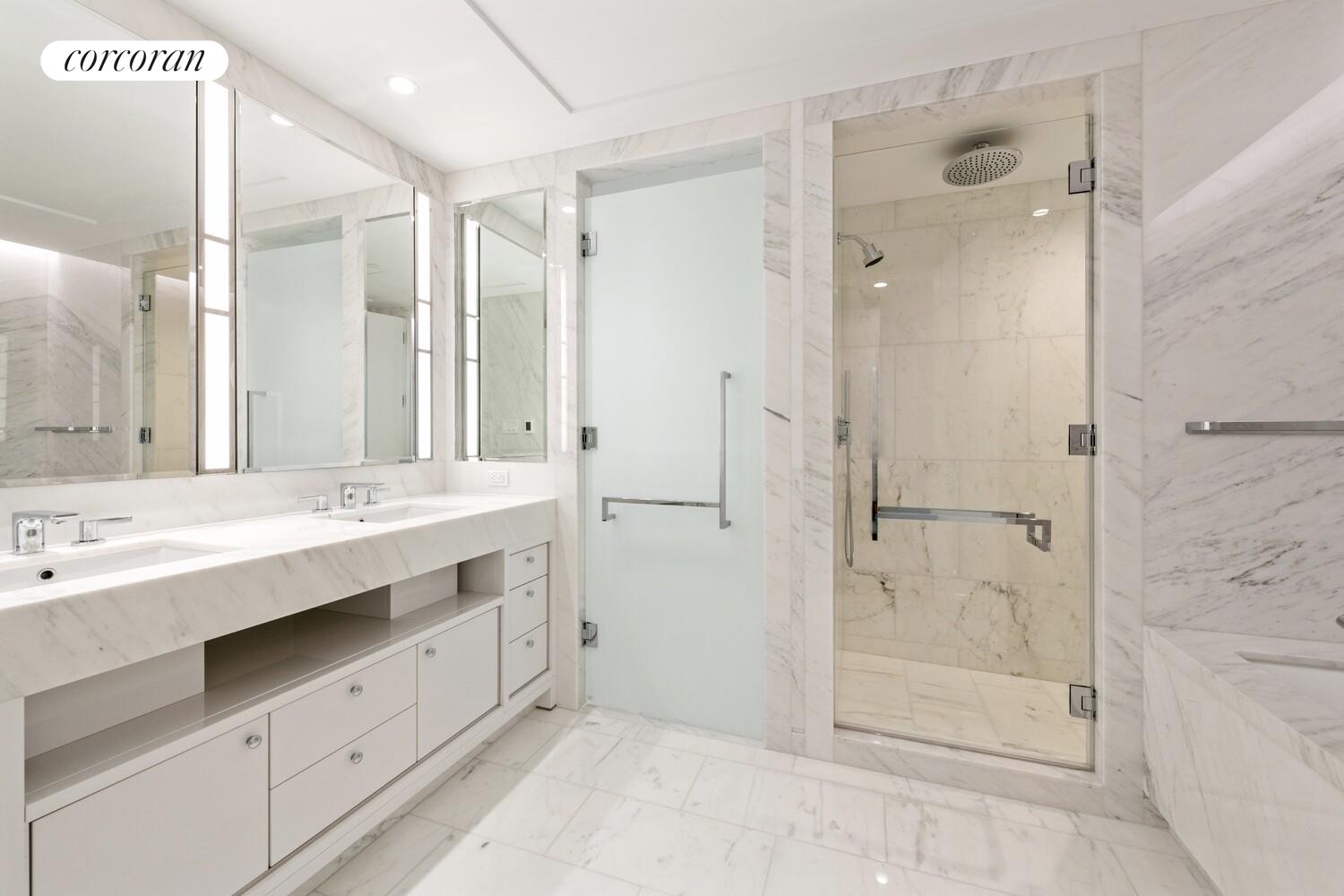 10 Riverside Boulevard, Unit 27C Manhattan, NY 10069 - Photo 8 of 14 a bathroom with a shower sink and mirror