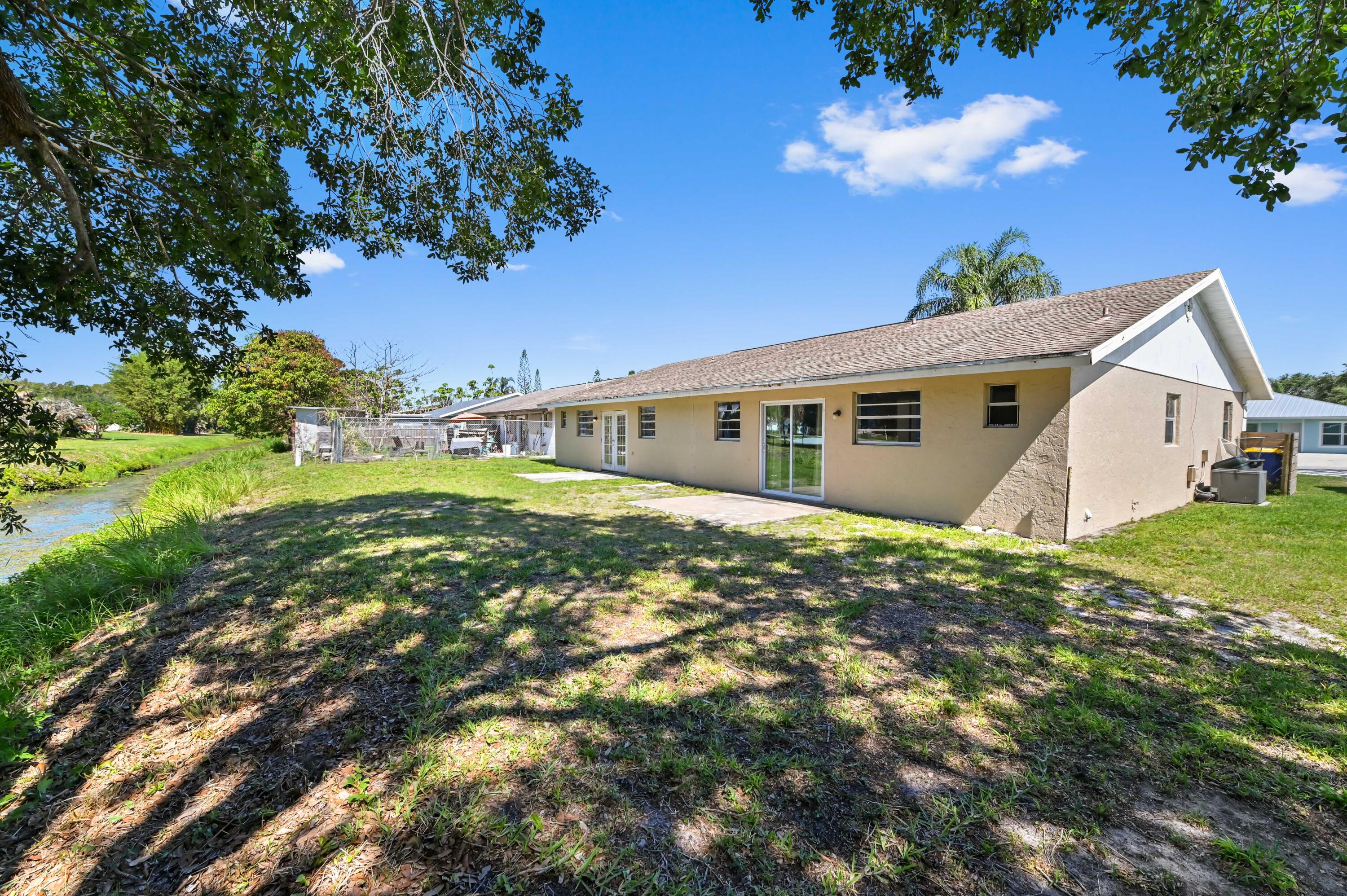 4548-4550 Southeast Salvatori Road Stuart, FL 34997 - Photo 40 of 41 19 backyard 02