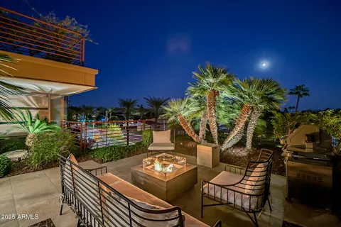 a kitchen with stainless steel appliances granite countertop a stove and a refrigerator