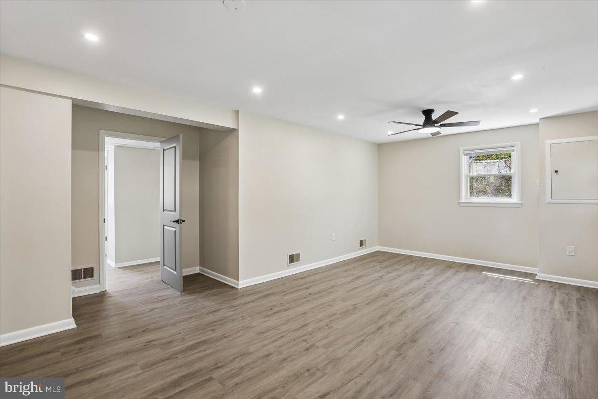 10701 Brunswick Avenue Silver Spring, MD 20902 - Photo 31 of 50 Family Room with New LVP Flooring