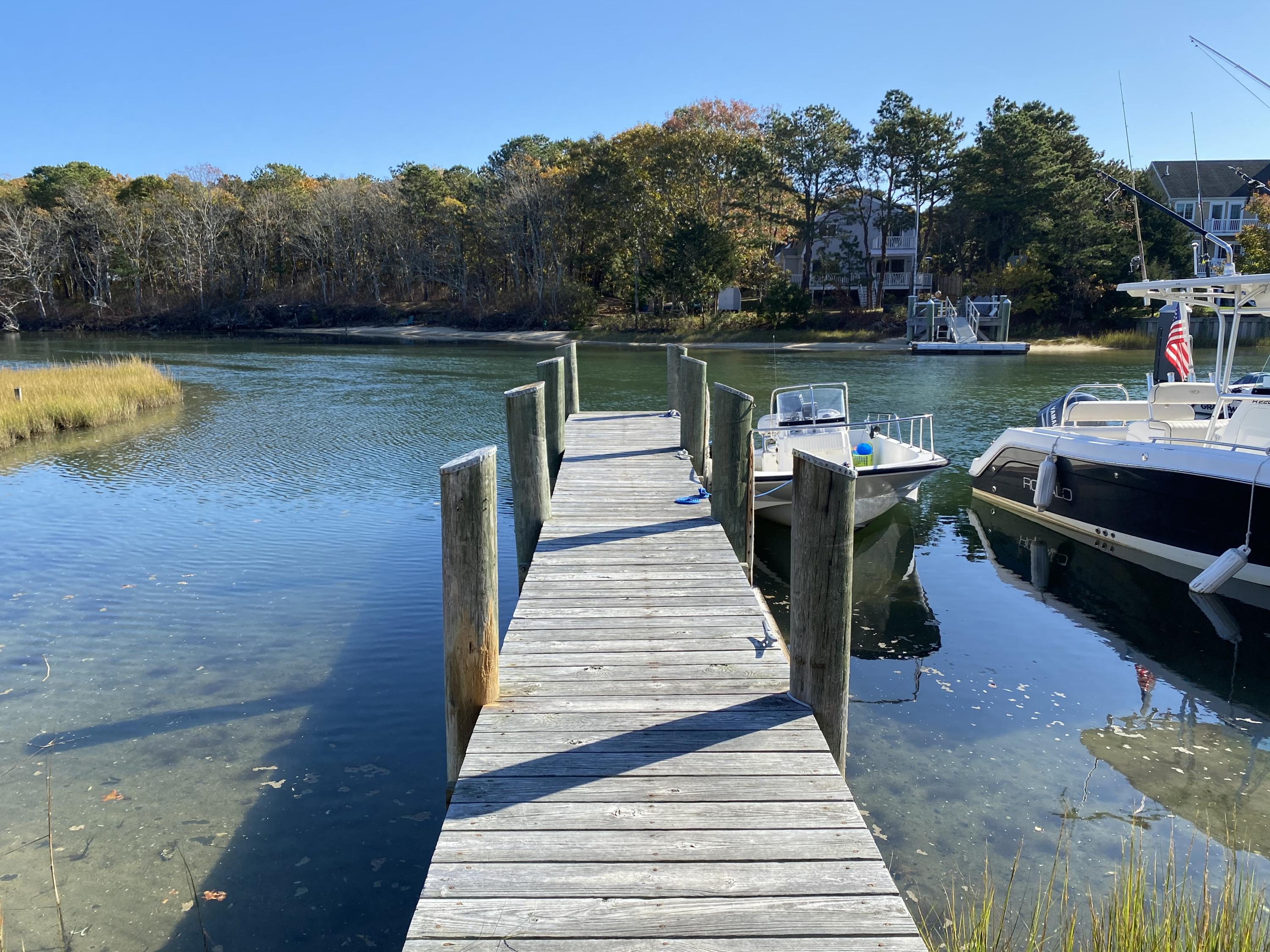 a lake view with a seating space