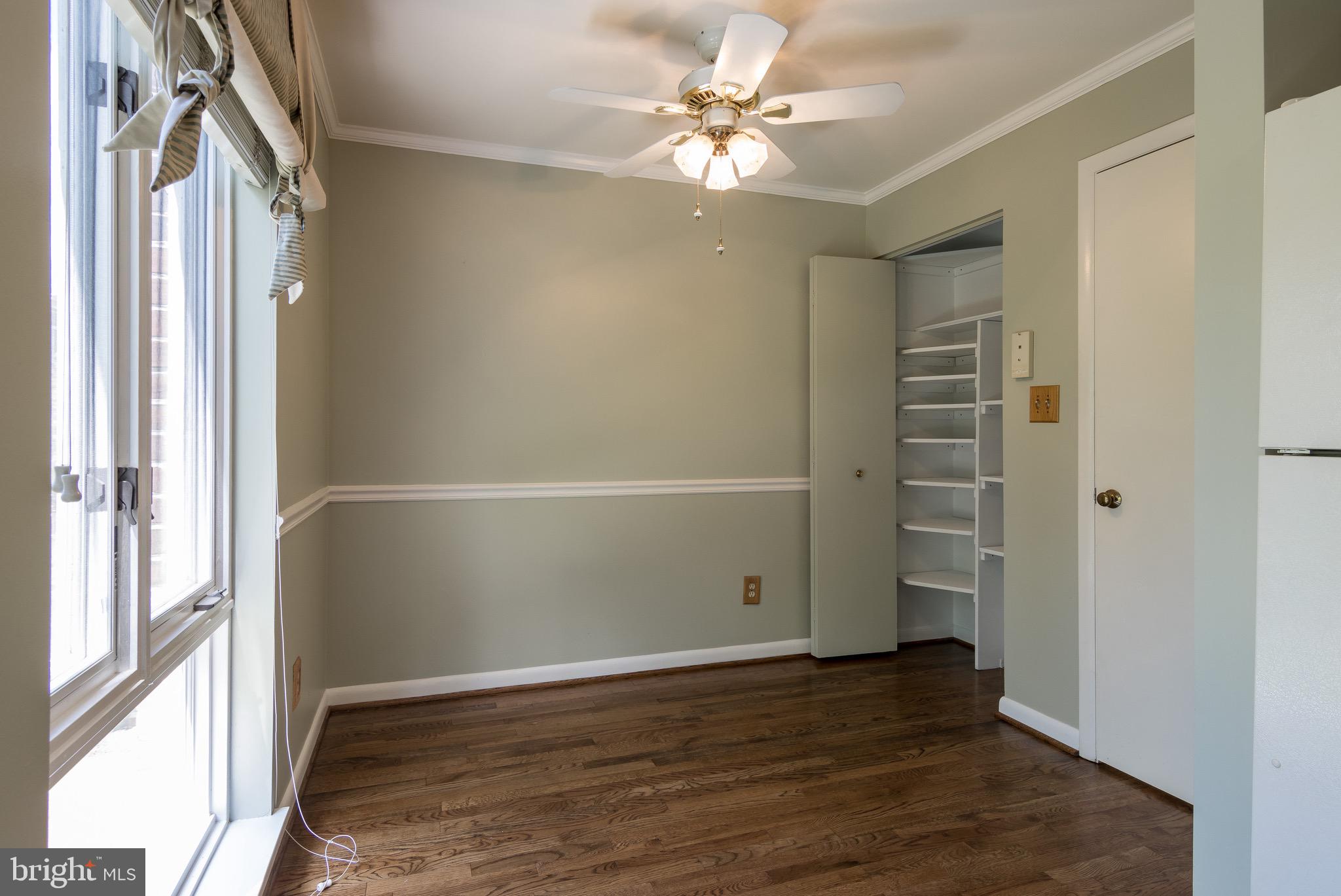 627 South Hanover Street Baltimore, MD 21230 - Photo 16 of 41 wooden floor in an empty room with a window