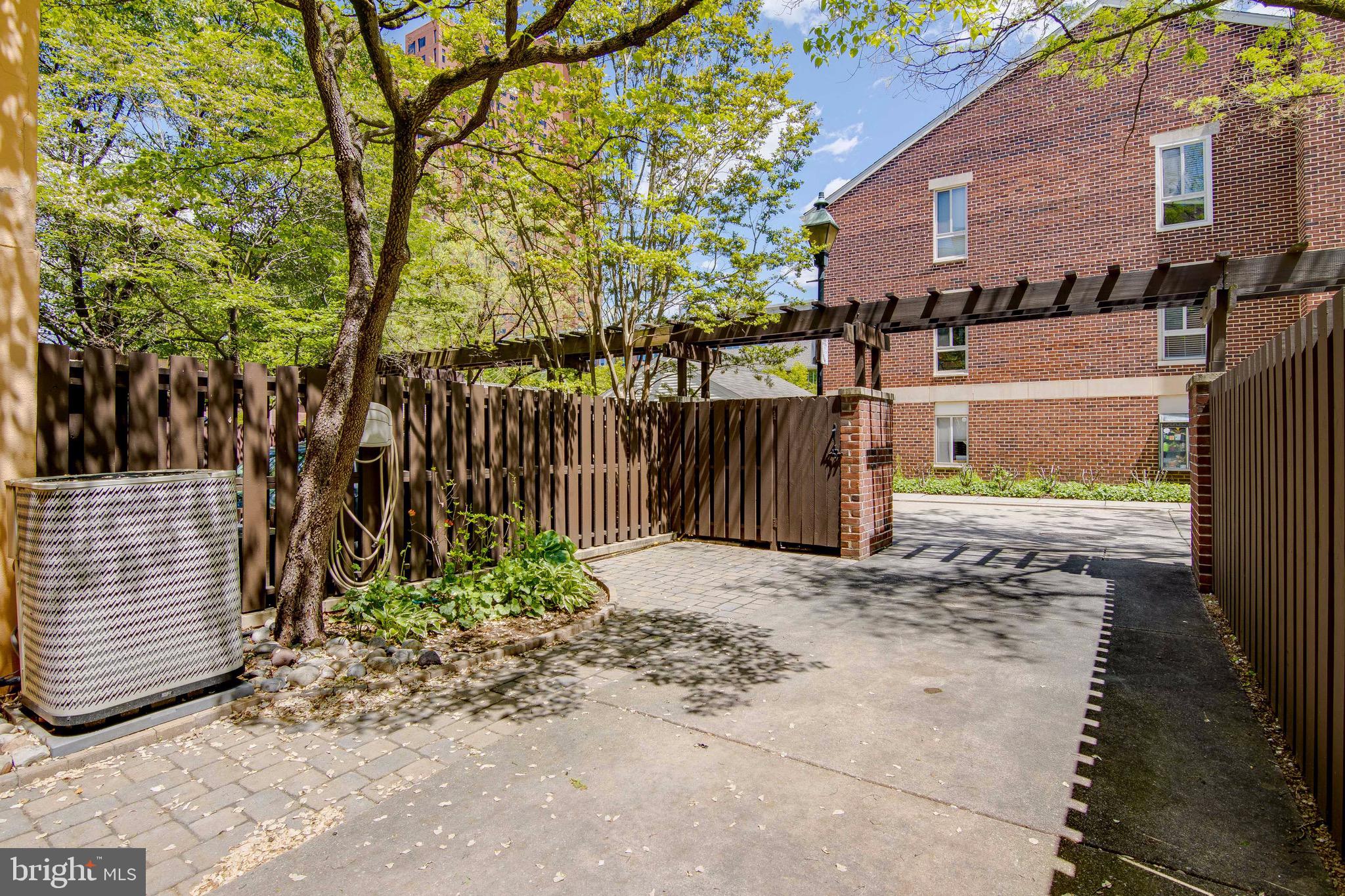 627 South Hanover Street Baltimore, MD 21230 - Photo 31 of 41 a view of a pathway of a house with wooden fence