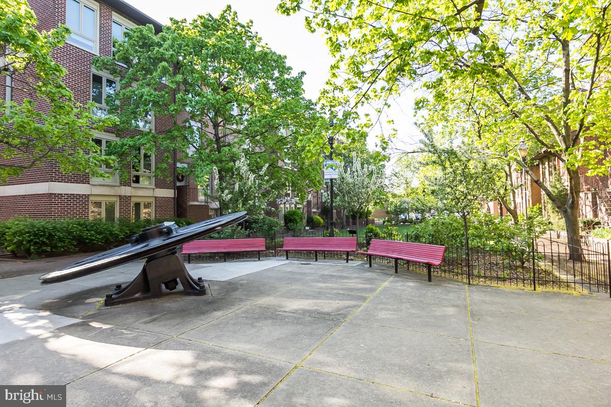 627 South Hanover Street Baltimore, MD 21230 - Photo 35 of 41 a view of outdoor space with seating area and trees around