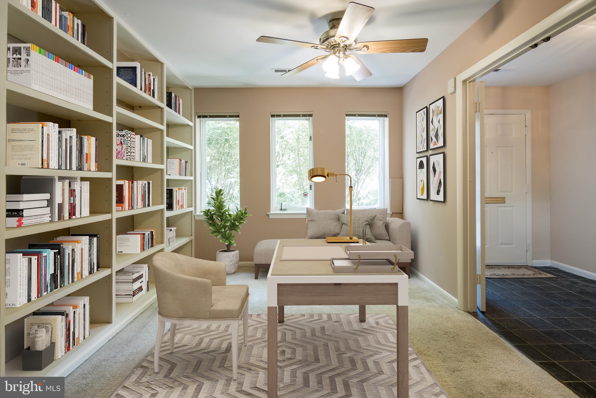 627 South Hanover Street Baltimore, MD 21230 - Photo 5 of 41 a view of a livingroom with furniture and a book shelf