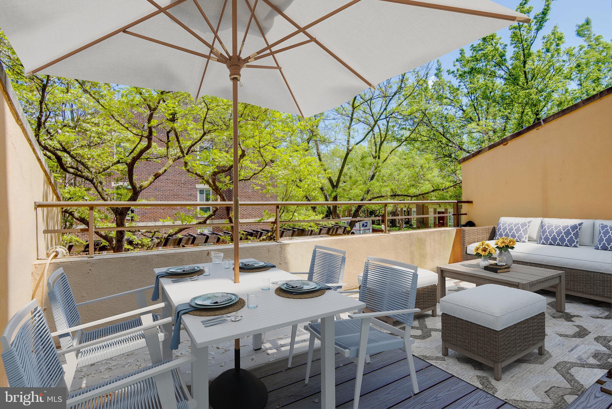 627 South Hanover Street Baltimore, MD 21230 - Photo 10 of 41 a view of table and chairs under an umbrella