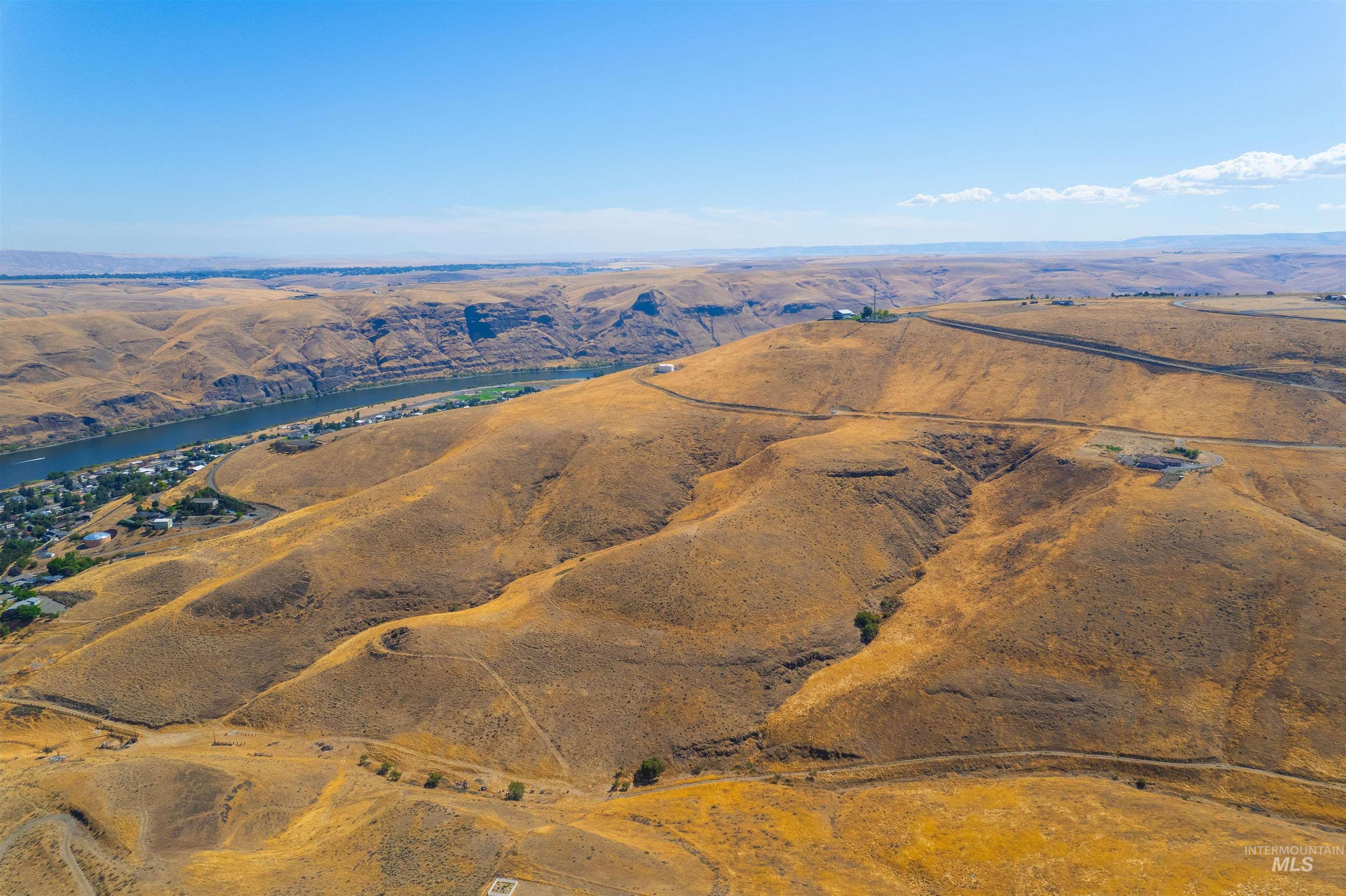 1550 Perro Pointe Road Asotin, WA 99402 - Photo 4 of 50 Overview of rural landscape featuring a mountain backdrop