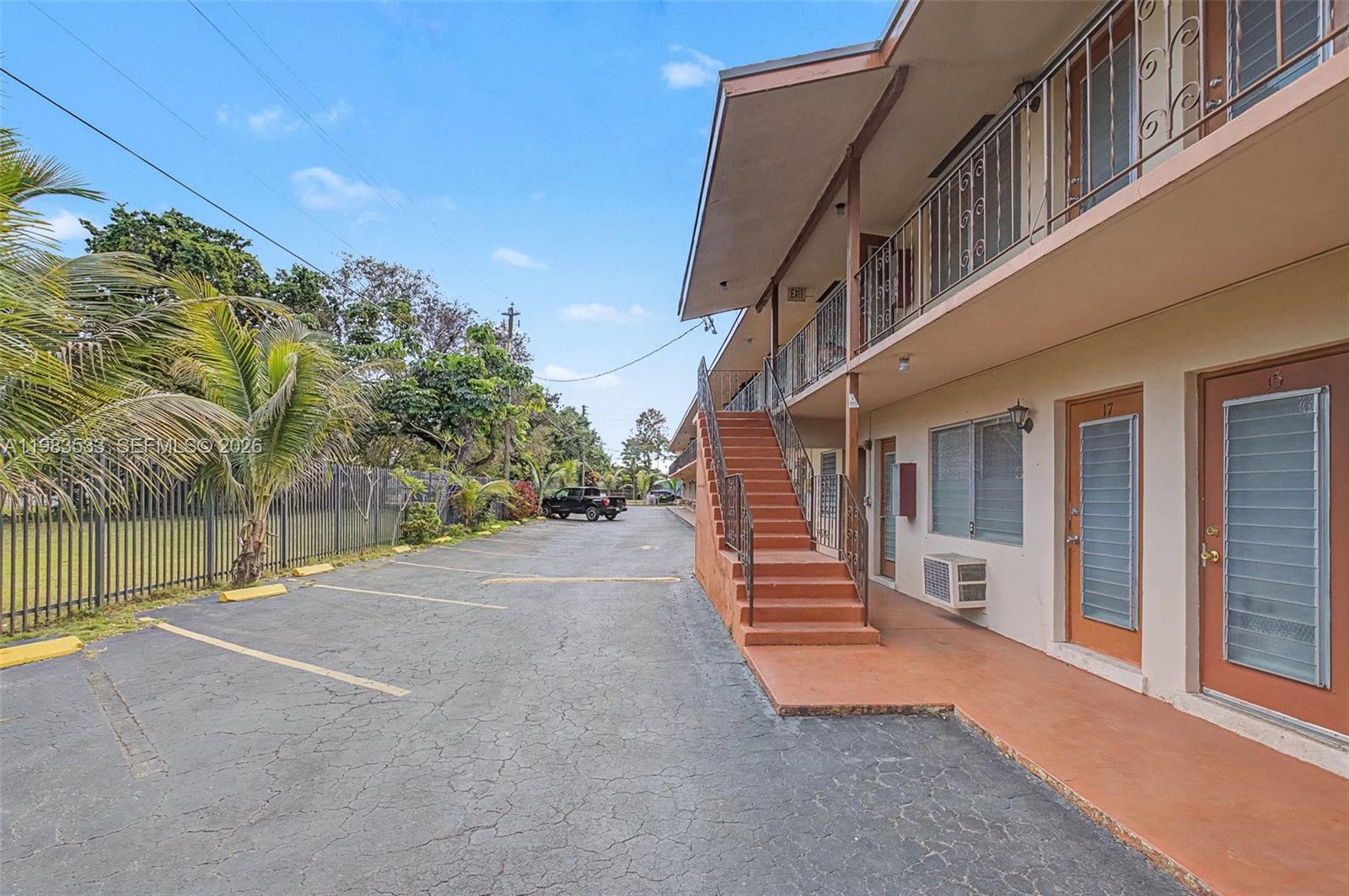 60 Northwest 79th Street, Unit 10 Miami, FL 33150 - Photo 12 of 18 a view of a house with a street