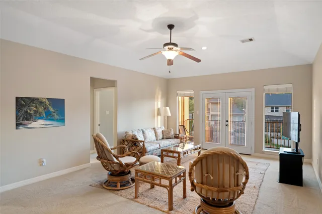 a en suite spacious bathroom with a double vanity sink a mirror a window and a mirror