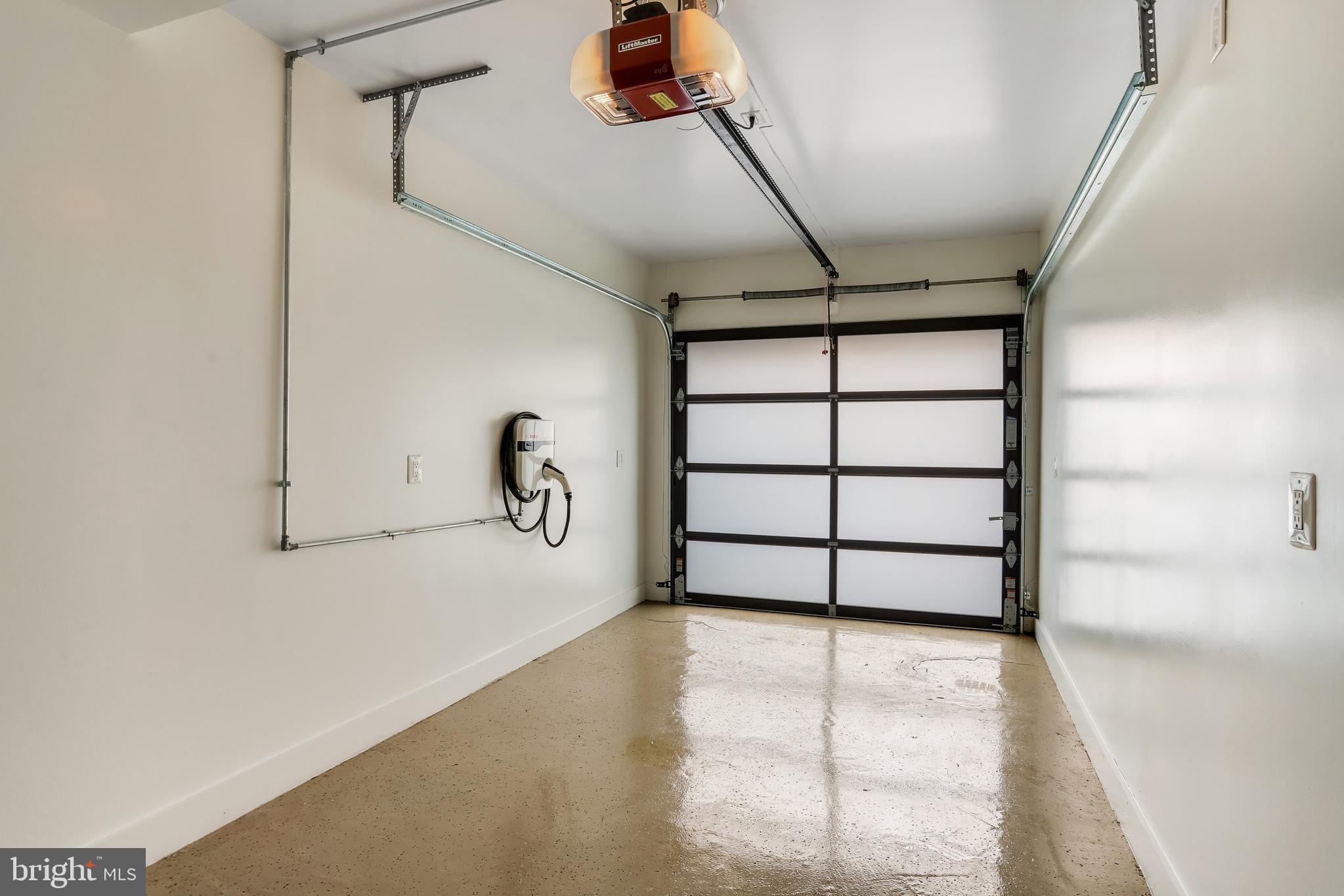 2927 Arizona Avenue Northwest Washington, DC 20016 - Photo 13 of 18 a view of a room with racks on the wall
