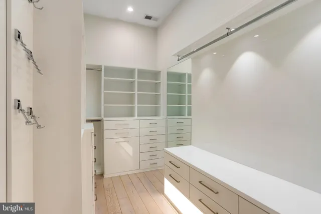 a bathroom with a shower and a sink