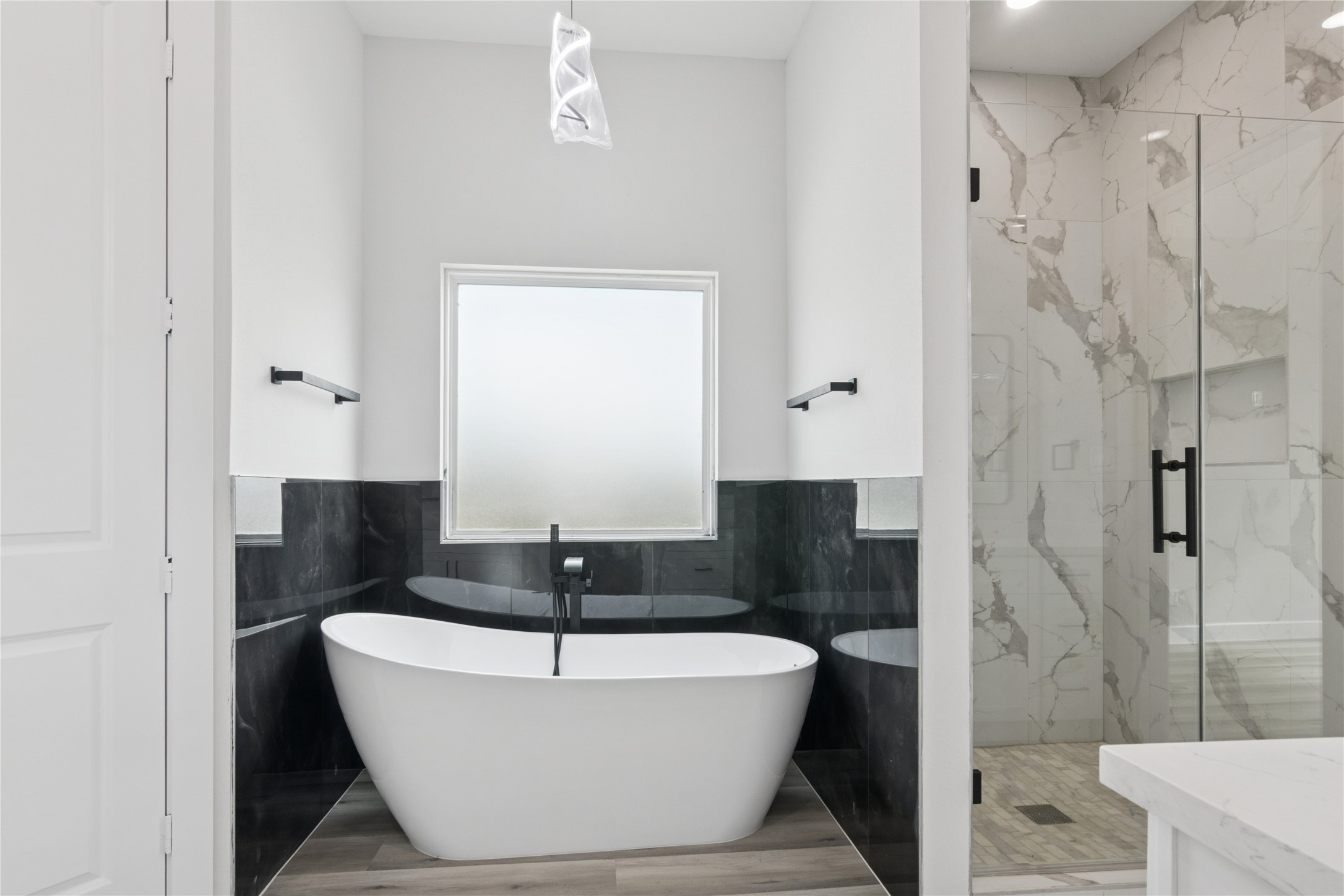 5766 Ward Bend Road Sealy, TX 77474 - Photo 31 of 45 a white bath tub sitting in a bathroom