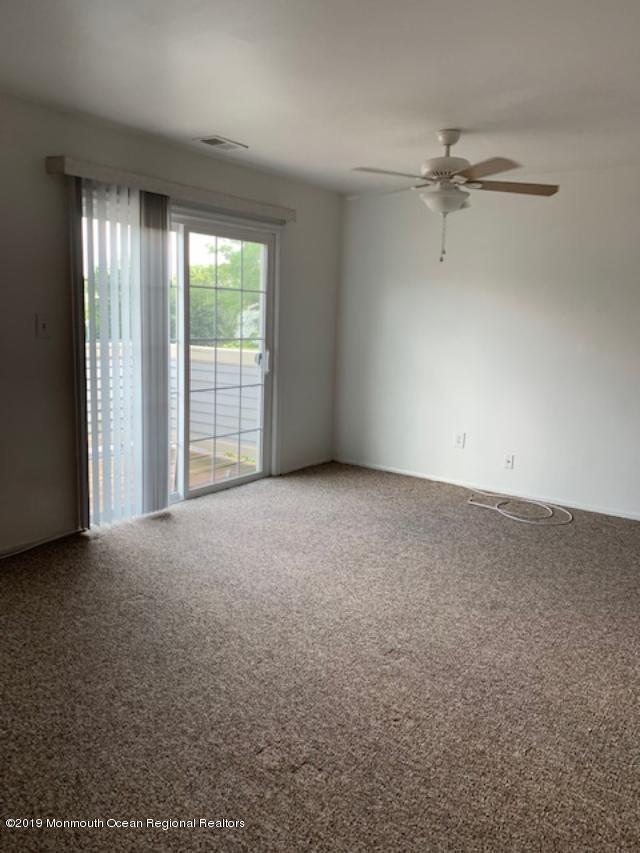 462 Magnolia Court Howell, NJ 07731 - Photo 2 of 2 a view of an empty room with a window