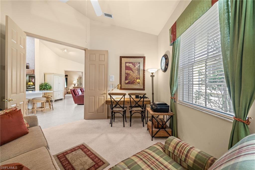 15214 Cape Sable Lane Fort Myers, FL 33908 - Photo 33 of 50 a living room with furniture and a large window