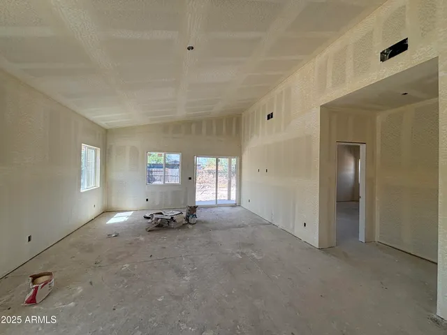 a view of empty room with windows