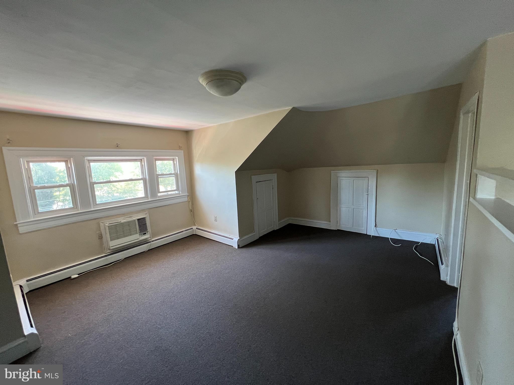 1050 Stuyvesant Avenue Trenton, NJ 08618 - Photo 4 of 11 an empty room with windows