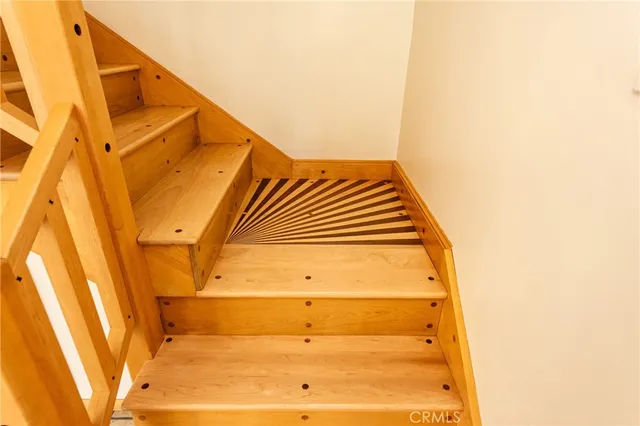 a view of a door with wooden floor