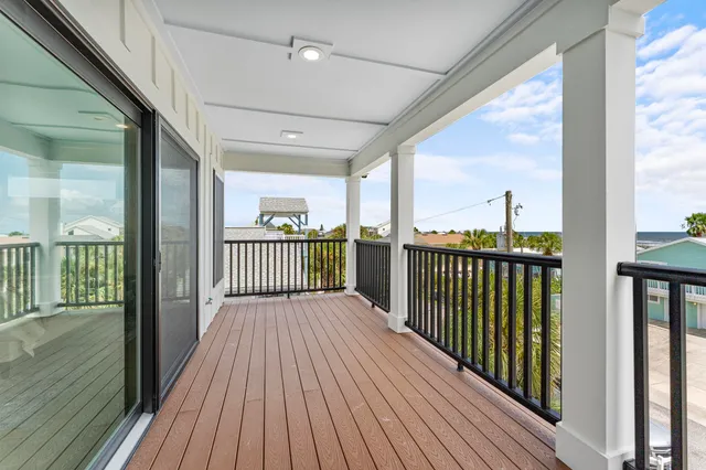 a view of a livingroom from the hallway