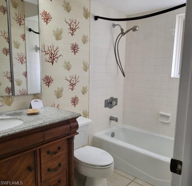 240 Palm River Boulevard, Unit C102 Naples, FL 34110 - Photo 16 of 17 a bathroom with a granite countertop sink toilet and shower