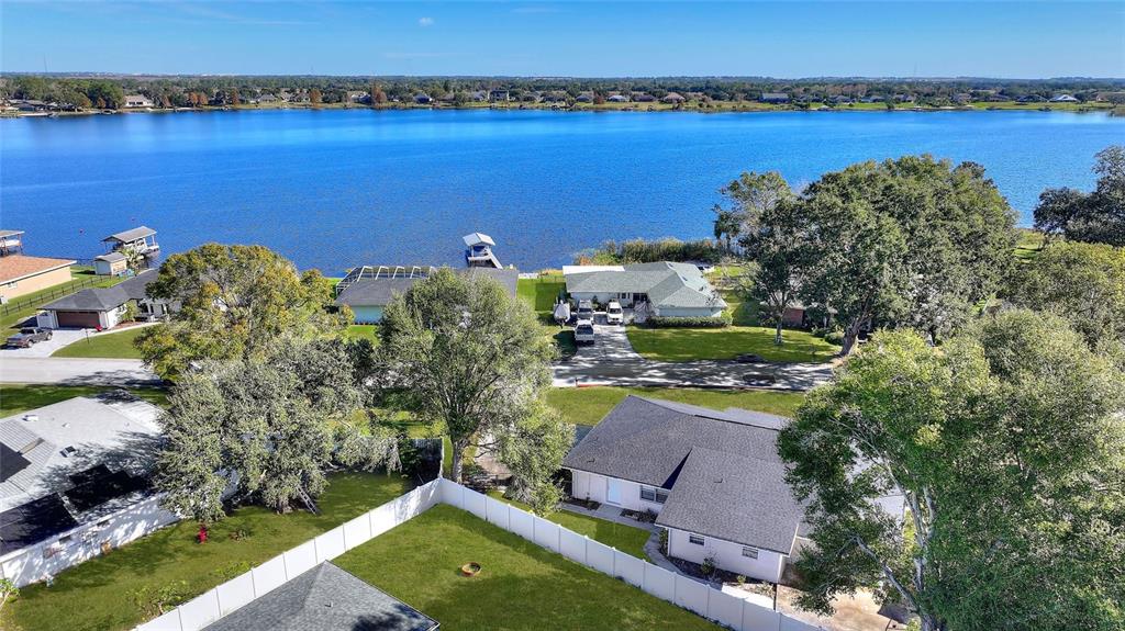 130 Audubon Road Winter Haven, FL 33884 - Photo 3 of 46 an aerial view of a house with a lake view