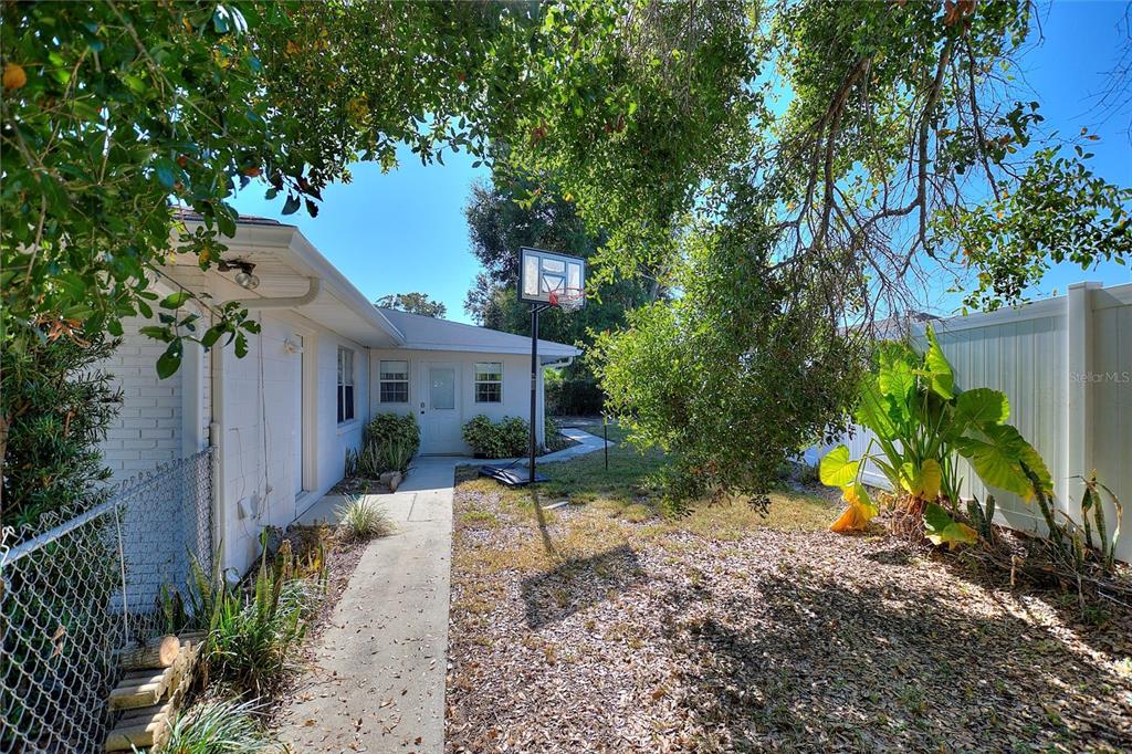 130 Audubon Road Winter Haven, FL 33884 - Photo 36 of 46 a front view of house with yard and seating area