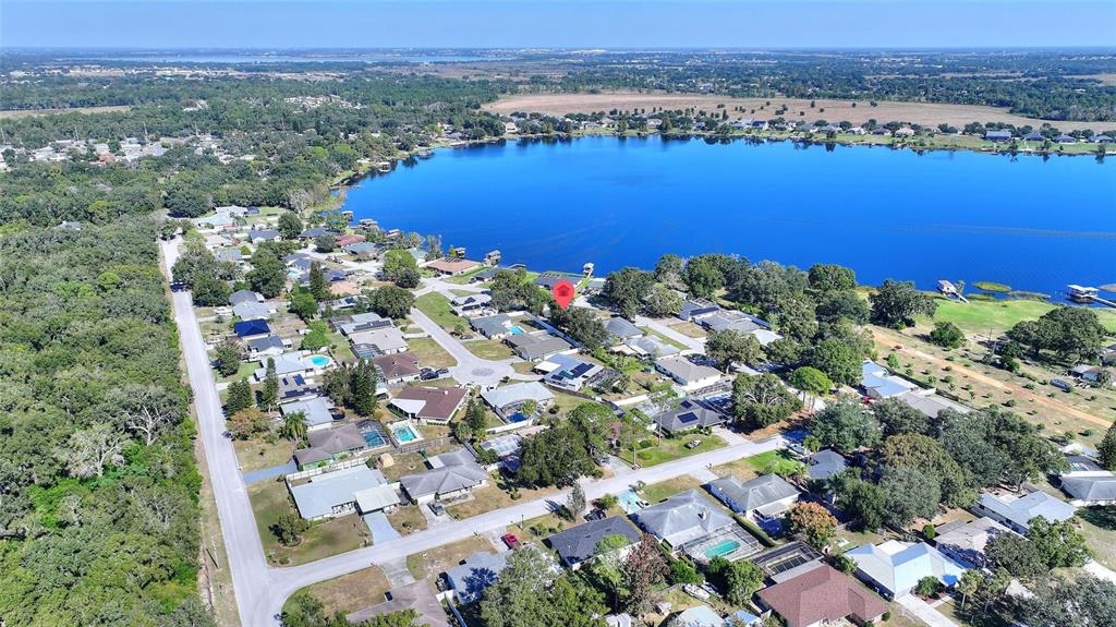 130 Audubon Road Winter Haven, FL 33884 - Photo 41 of 46 an aerial view of ocean and residential houses with outdoor space