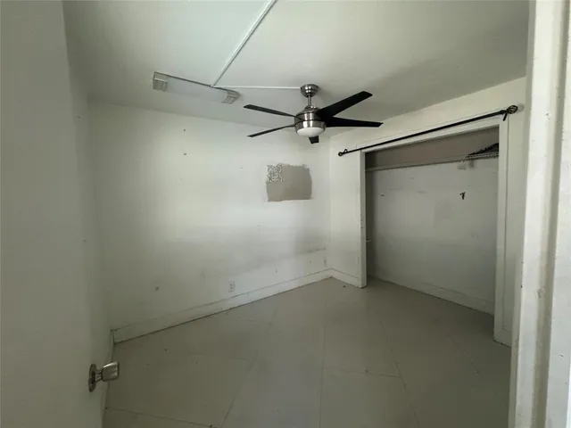 a view of a window in an empty room