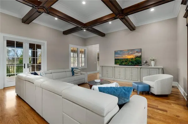 a kitchen with stainless steel appliances granite countertop a stove microwave and cabinets