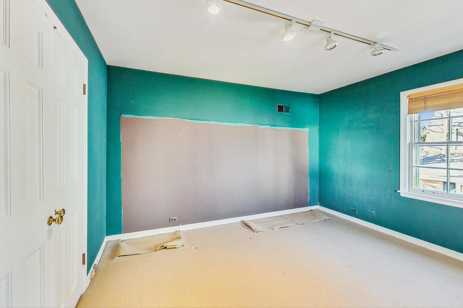 765 Walden Road Winnetka, IL 60093 - Photo 25 of 40 a view of an empty room with windows