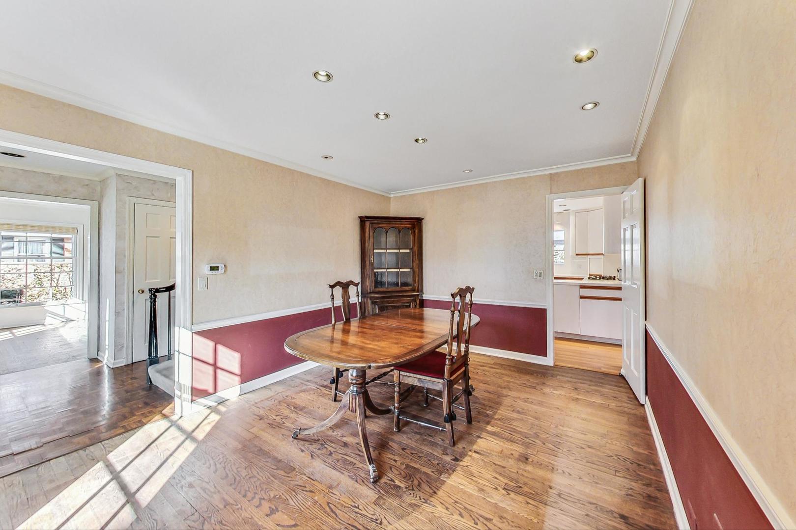 765 Walden Road Winnetka, IL 60093 - Photo 6 of 40 a dining room with furniture and wooden floor