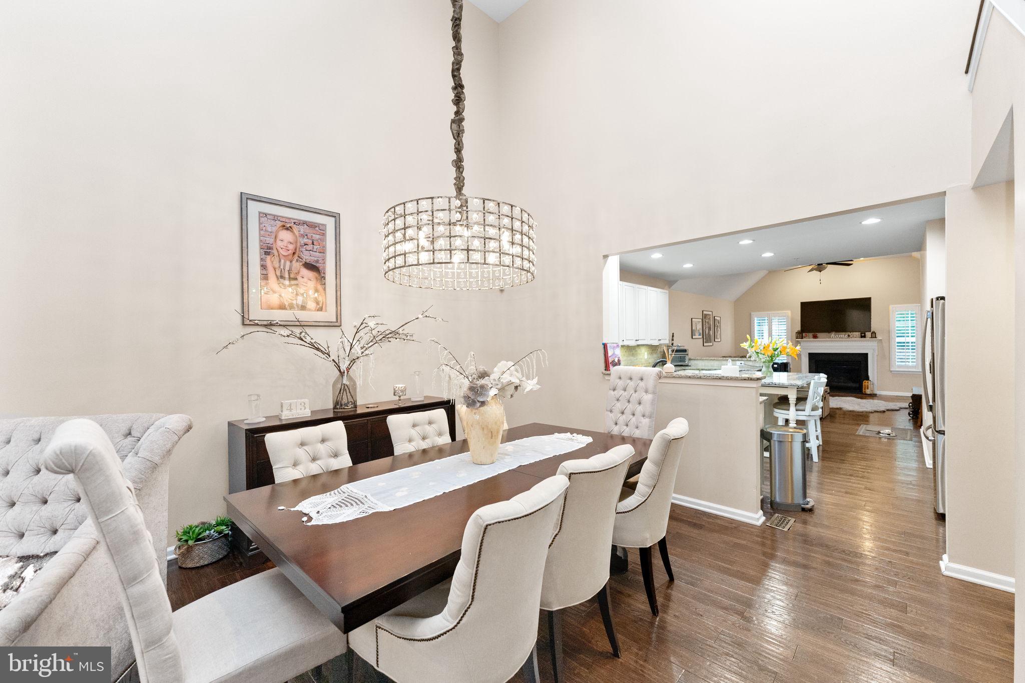 870 Reynards Run Blue Bell, PA 19422 - Photo 7 of 30 a view of a dining room with furniture and wooden floor