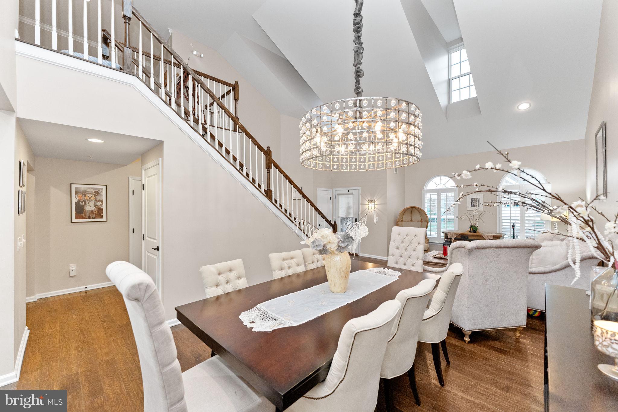 870 Reynards Run Blue Bell, PA 19422 - Photo 9 of 30 a living room with furniture and a chandelier