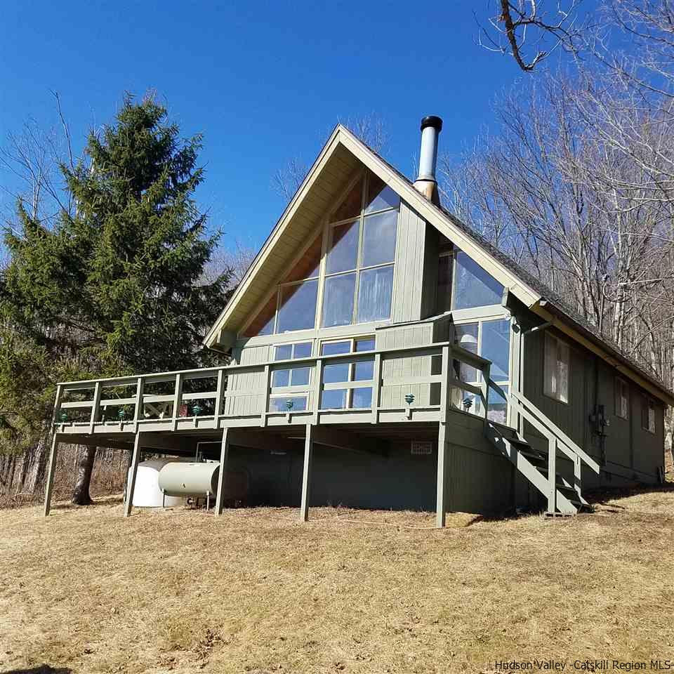 178 Upper Highland Circle Roxbury, NY 12421 - Photo 1 of 35 a view of a house with a wooden fence
