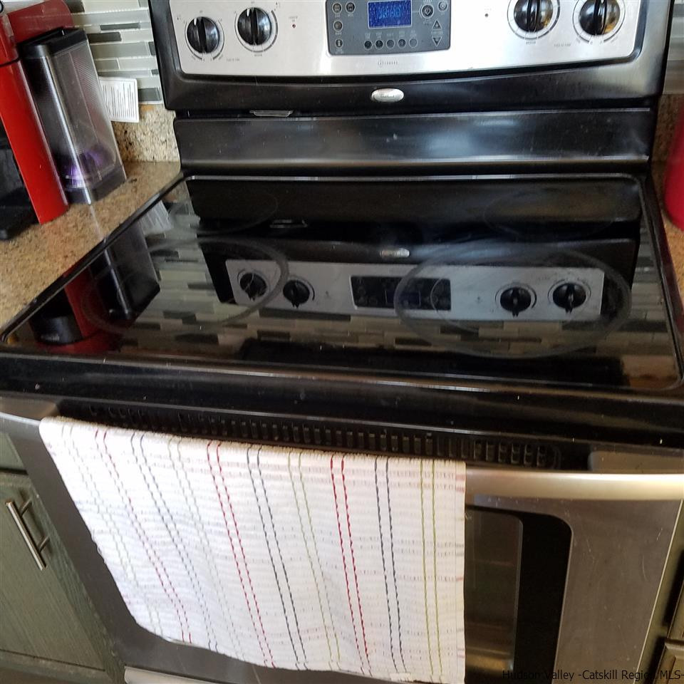 178 Upper Highland Circle Roxbury, NY 12421 - Photo 15 of 35 a close view of stove top oven