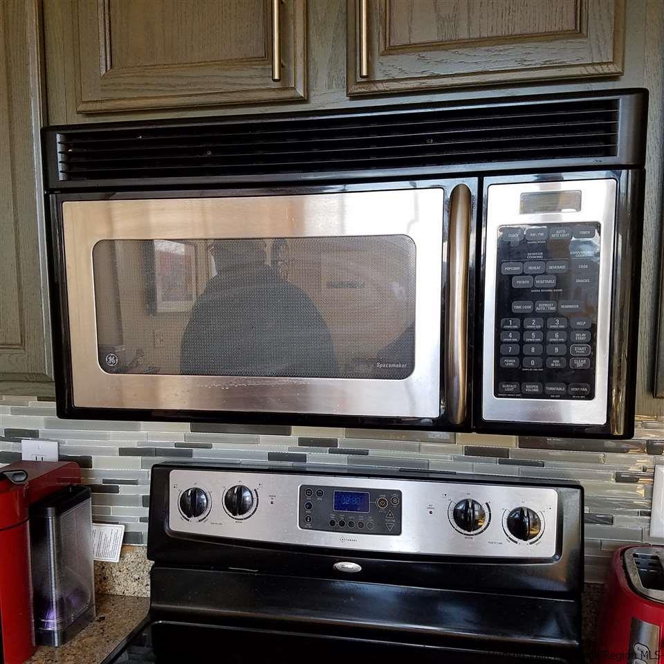 178 Upper Highland Circle Roxbury, NY 12421 - Photo 16 of 35 a stove top oven sitting inside of a kitchen