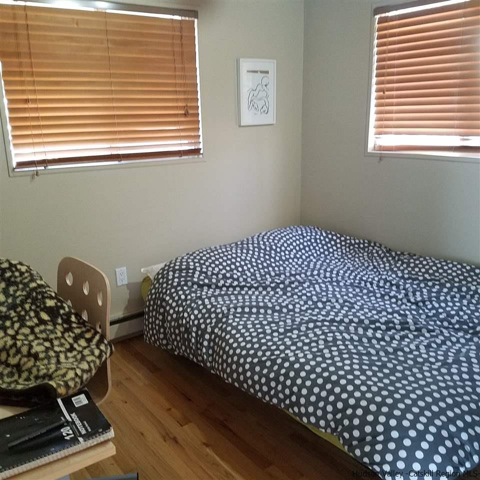 178 Upper Highland Circle Roxbury, NY 12421 - Photo 8 of 35 a bedroom with a bed
