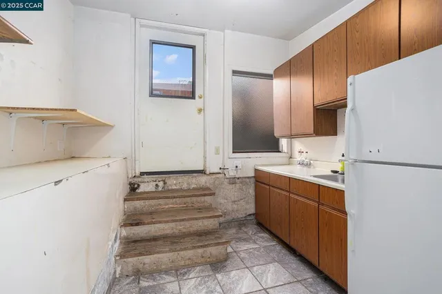 a bathroom with a sink and mirror