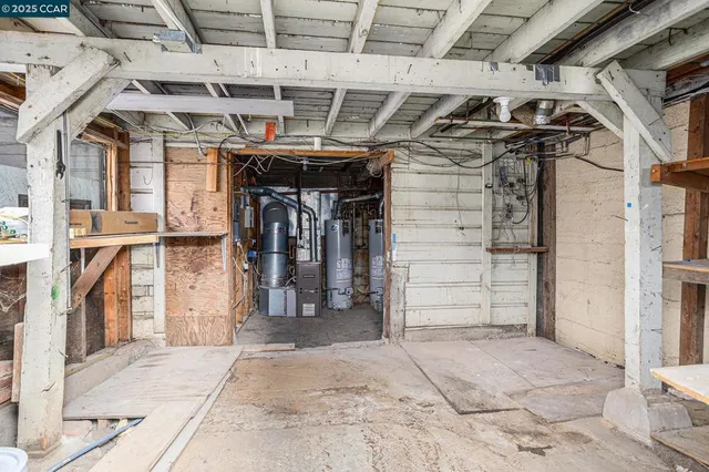 a view of a white building among the street