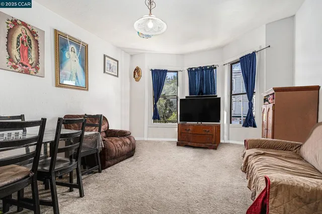 a view of dining room and livingroom with furniture