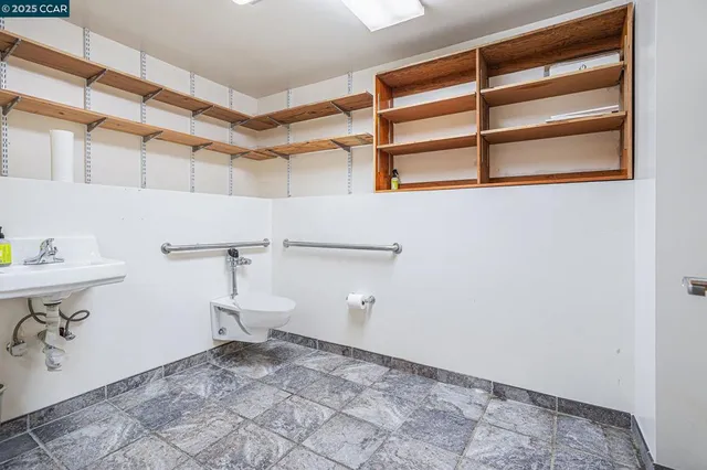 a view of a room with racks on the wall