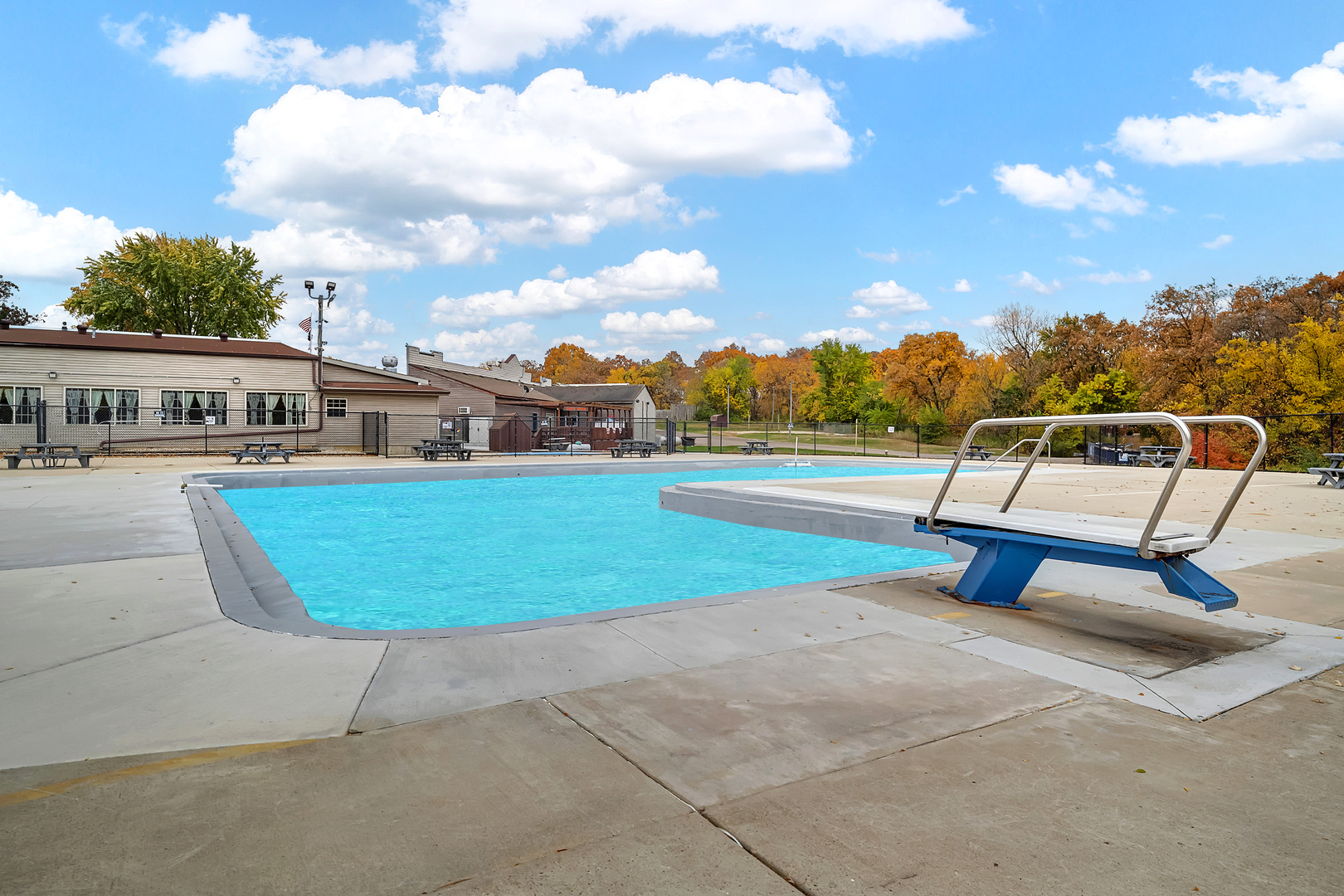 2795 East 28th Road Marseilles, IL 61341 - Photo 69 of 69 a view of a swimming pool with a garden and trees