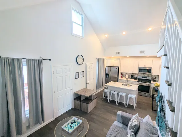 a living room with a couch and a table