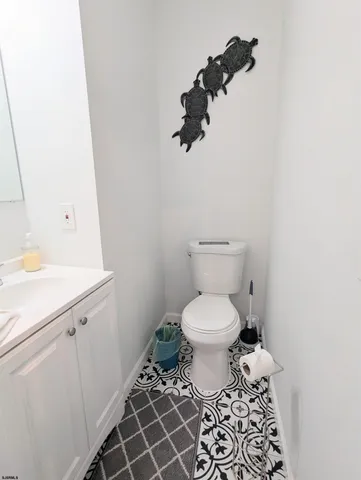 a bathroom with a toilet and a sink