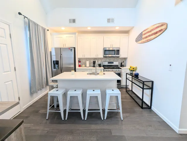 a view of a dining room with furniture