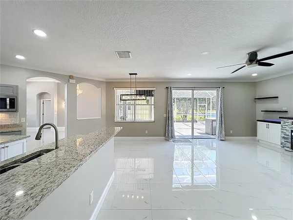 $560,000 | 9334 Whispering Meadows Lane, Orlando, FL 32825