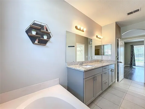 $560,000 | 9334 Whispering Meadows Lane, Orlando, FL 32825