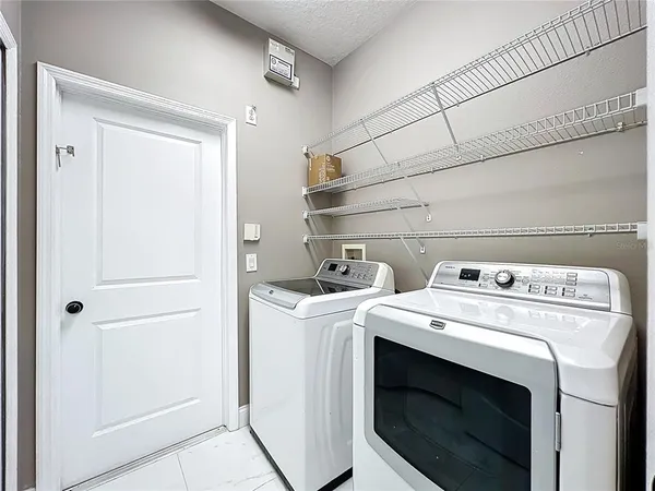 $560,000 | 9334 Whispering Meadows Lane, Orlando, FL 32825