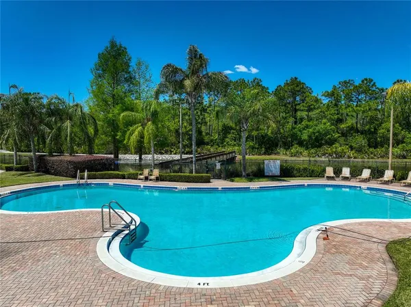 $560,000 | 9334 Whispering Meadows Lane, Orlando, FL 32825